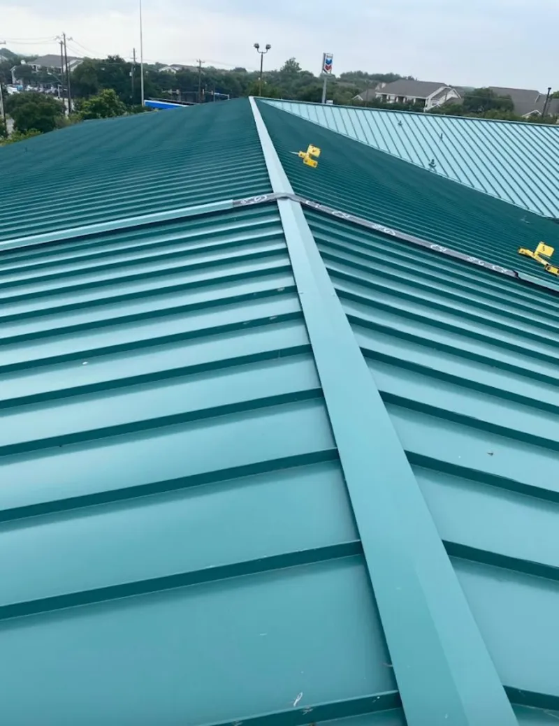 Green commercial metal roof ridge and valley for Metal Roof Repair in Johns Creek